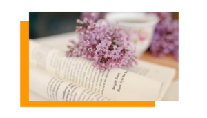 An open book with some flowers